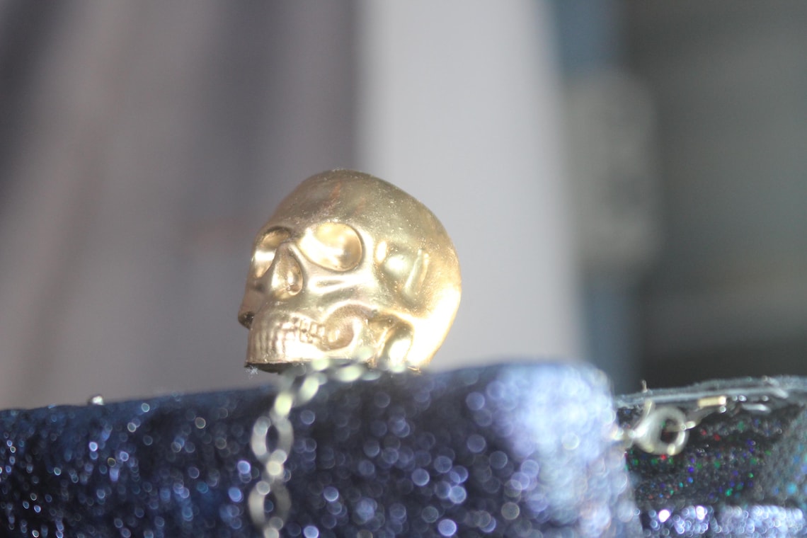 Skull Woman Blue Clutch Bag